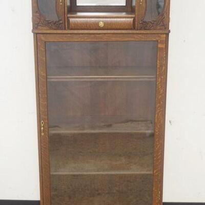 1136	VICTORIAN OAK BOOKCASE WITH MIRROR BACK DOUBLE DISPLAY COMPARTMENT TOP, APPROXIMATELY 13 IN X 29 IN X 67 IN HIGH

