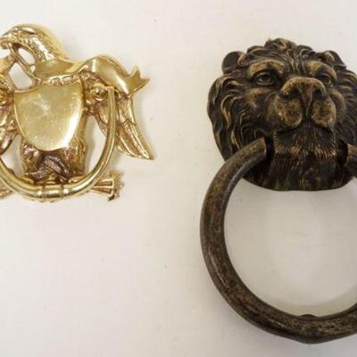 1266	LOT OF 2 BRASS DOOR KNOCKERS, LARG LION AND EAGLE. LION APPROXIMATELY 11 IN
