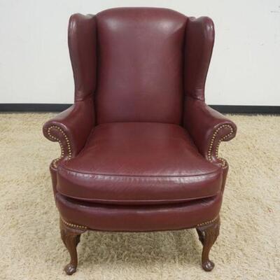 1145	LEATHER NORTH HICKORY WING CHAIR WITH BRASS TACK ACCENTS
