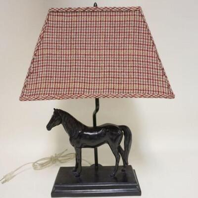 1228	EQUESTRIAN COMPOSITE TABLE LAMP, APPROXIMATELY 23 IN HIGH, STRESS CRACKS ON LEGS

