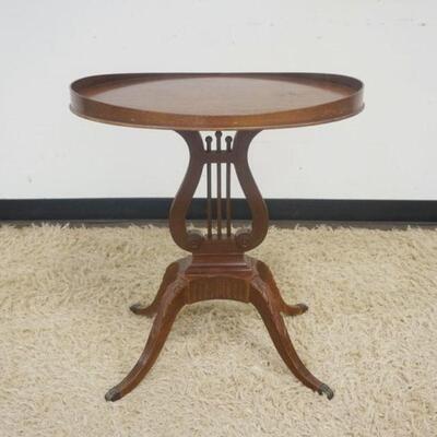 1137	MAHOGANY LYRE BASE LAMP TABLE, APPROXIMATELY 18 IN X 24 IN X 26 IN HIGH
