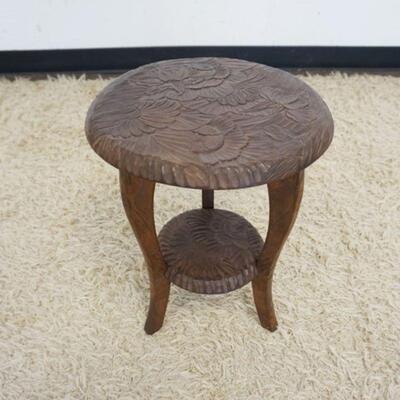 1194	SMALL CARVED ASIAN STAND, APPROXIMATELY 14 IN DIAMETER X 17 IN HIGH
