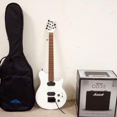 1265	STERLING AXIS ELECTRIC GUITAR AND MARSHAL CODE 25 AMP, GUITAR COMES IN STADIUM SOFT CARRYING CASE. AMP IS NEW WITH BOX, TAGS AND...