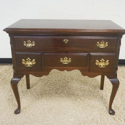 1139	PENNSYLVANIA HOUSE BLACK CHERRY QUEEN ANNE STYLE 4 DRAWER LOW BOY WITH REEDED COLUMN FRONTS. APPROXIMATELY 18 IN X 37 IN X 34 IN HIGH
