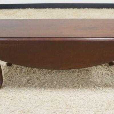 1141	SOLID CHERRY DROP LEAF QUEEN ANNE STYE COFFEE TABLE, APPROXIMATELY 49 IN X 18 IN HIGH. 35 IN WHEN OPENED
