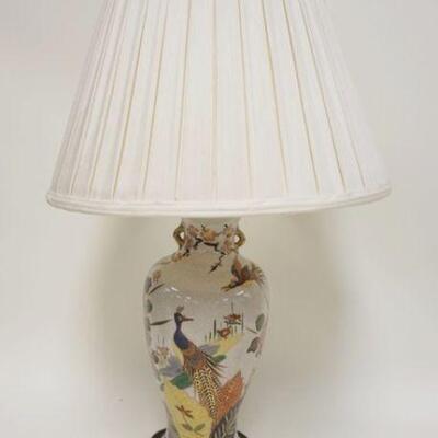 1223	ASIAN STYLE TABLE LAMP ON WOOD BASE, APPROXIMATELY 33 IN HIGH
