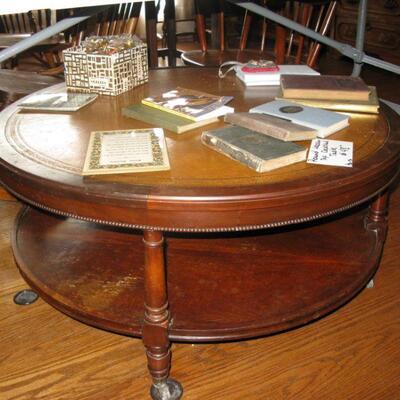 LEATHER TOP ROUND COFFEE TABLE  $ 48.00