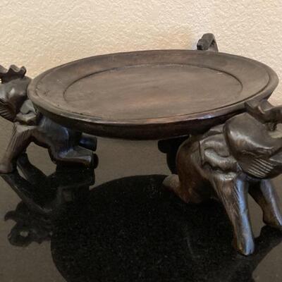 Wood Elephant Stand
 is 10in diameter x 4in tall