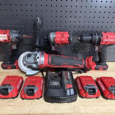 Craftsman Portable Tool Lot w/ 4- V20 Batteries &
Description
Battery Charger
Brush Less Grinder
Impact Drivers
Drill