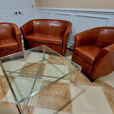 Tub love seat and chairs , and glass table