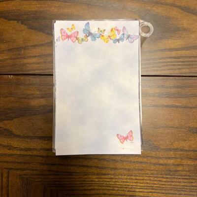 Butterfly notepad holder with pen holder