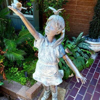 Yard bronze..girl with birds