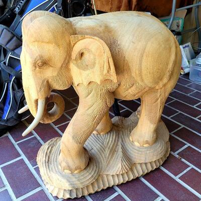 Large hand carved wooden elephant