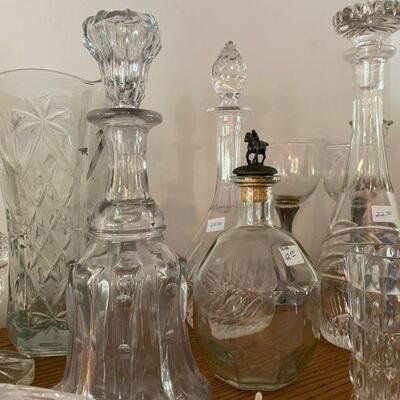 Collection of cut crystal and glass decanters