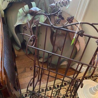 Wrought iron magazine rack and large metal Pumpkin  