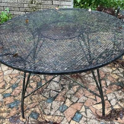 48" metal patio table -- sold with 4 metal patio arm chairs