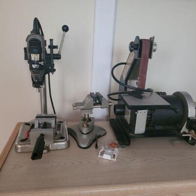 small table top drill press and a sander