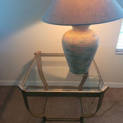 matching glass top end table and a lamp