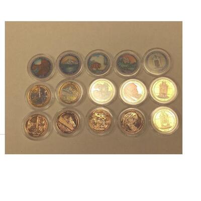 https://www.agesagoestatesales.com/product/lan3703a-vintage-lot-of-fifteen-2010-painted-sticker-gold-plated-usa-quarters/228	LAN3703A...