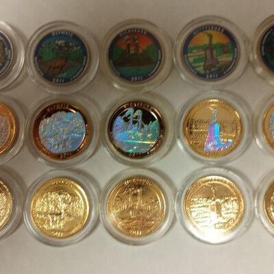 https://www.agesagoestatesales.com/product/lan3702-vintage-lot-of-fifteen-2011-painted-sticker-gold-plated-usa-quarters/227	LAN3702A...