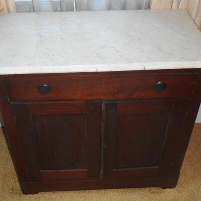 Marble top server, top drawer has silverware liner
