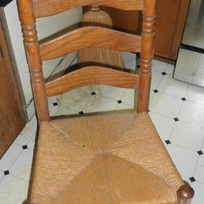 1 of 6 oak chairs with woven seats