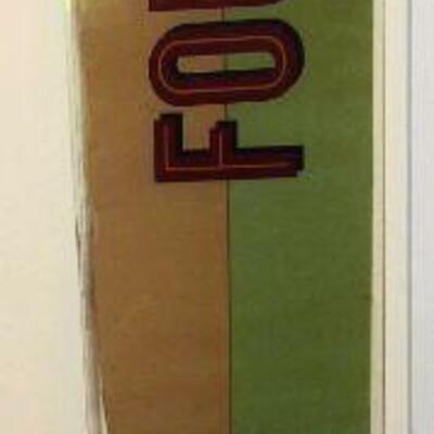 large glass & paper coke signage
