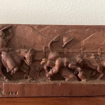 Wood Carving of Cowboys is 20in x 11in