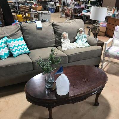 Several sofas, side tables, coffee tables…