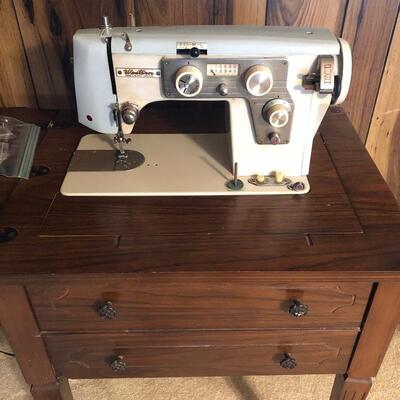 Western sewing machine in cabinet
(Not running)