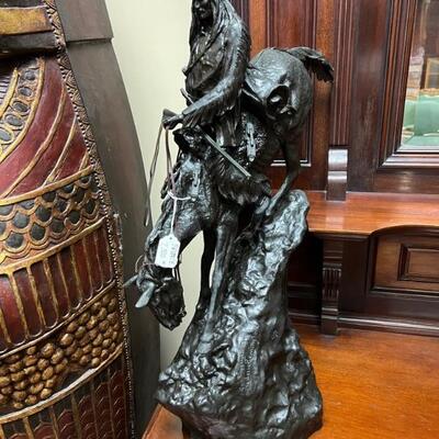 Bronze Native American sculpture on a horse