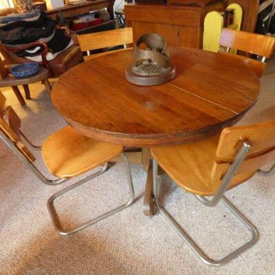 Antique round table w/ four cantilevered chairs