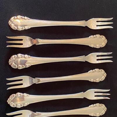 Six Georg Jensen Sterling Silver Three Tine Forks; Georg Jensen Oyster or Pastry Forks. Each measuring about 5.2” long 