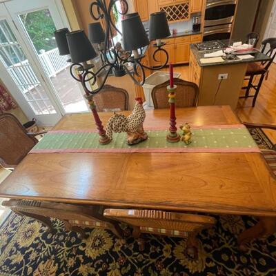 French antique reproduction kitchen or dining room set. Table with six chairs. Includes one leaf. Measures 76 x 45. Like new! Cost over...