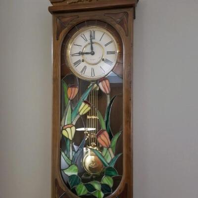 Wall clock with stained glass tulips