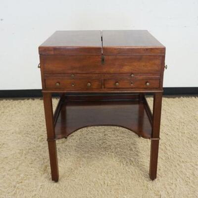1071	ANTIQUE MAHOGANY GEORGIAN WELSH STAND W/2 DRAWERS, PULL OUT SURFACE & INTERIOR COMPARTMENTS, APPROXIMATELY 24 IN X 20 IN X 33 IN HIGH

