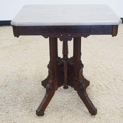 1074	WALNUT VICTORIAN MARBLE TOP PARLOR TABLE, APPROXIMATELY 27 IN X 20 IN X 30 IN HIGH
