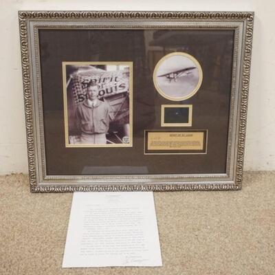 1034	SPIRIT OF ST LOUIS FRAMED MEMMORABILIA; PHOTOS OF OF CHARLES LINDBERGH & THE SPIRIT OF SAINT LOUIS, & A SMALL PIECE OF FABRIC TAKEN...