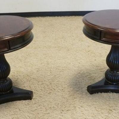 1112	PAIR OF HOOKER MAHOGANY ONE DRAWER ROUND LAMP TABLES
