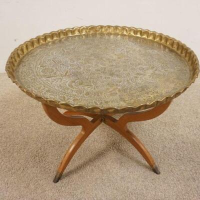 1046	LARGE HAND TOOLED ASIAN BRASS TRAY ON STAND, TRAY IS APPROXIMATELY 28 1/2 IN

