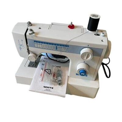  Lot 142
White Sewing Machine