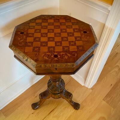 Antique game table with hidden compartment