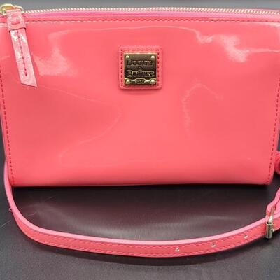 Dooney & Bourke Pink Patent Leather Clutch with
Crossbody Strap 
