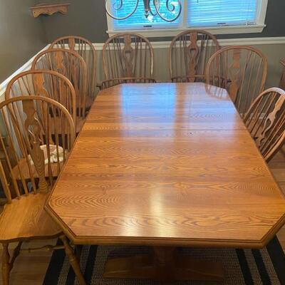 Oak Dining table and 8 matching chairs