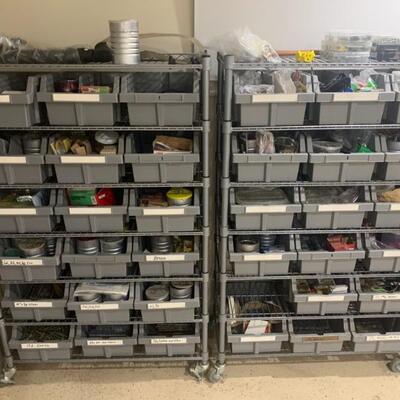 Pr. of Seville Classics commercial six tier 18 bin racks w/ assorted hardware on casters.