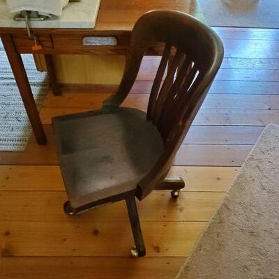 Antique oak office chair.  Rollers are not original