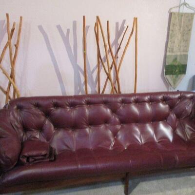 Rosewood leather sofa w/Scandanavian design. Great condition. 