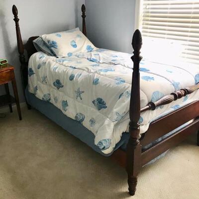 four poster twin bed $269
includes boxspring and mattress