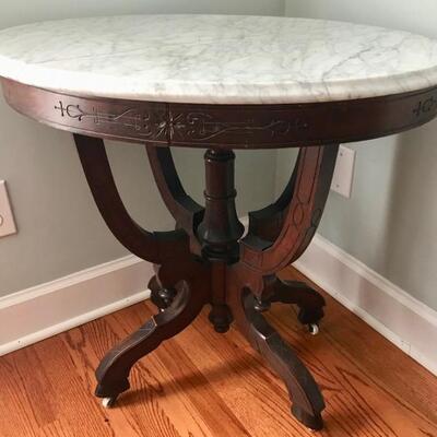 oval marble top table $139
30 X 22 X 29