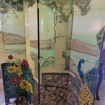 room divider with different scenes on each side